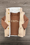 Mom & Me - "Cozy" Vest Set - CHILD-6-12 Months - Tan sherpa-lined sleeveless vest with gold snap buttons layered over a brown long-sleeve shirt with "Cozy" text in cream.