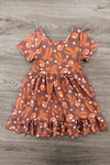 Pumpkin Pie Glitter Dress - 6-12 Months - Brown short-sleeve dress with orange and white fall leaf and acorn print, ruffled hem, and gathered waist.