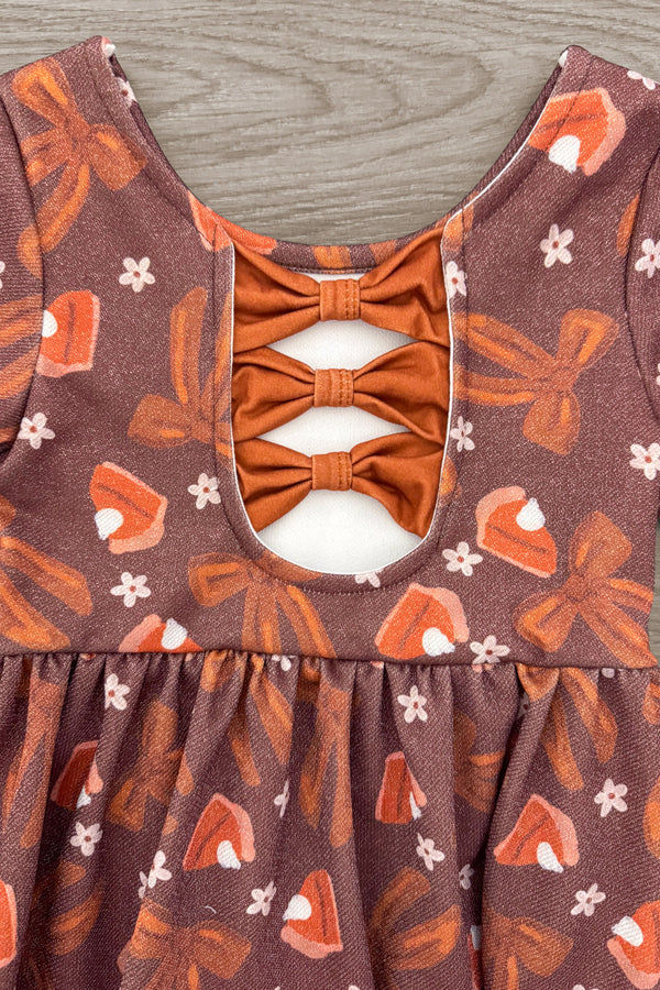 Pumpkin Pie Glitter Dress - 6-12 Months - Brown sleeveless dress with orange bows and a cutout back, featuring glittery pumpkin pie and autumn-themed print.