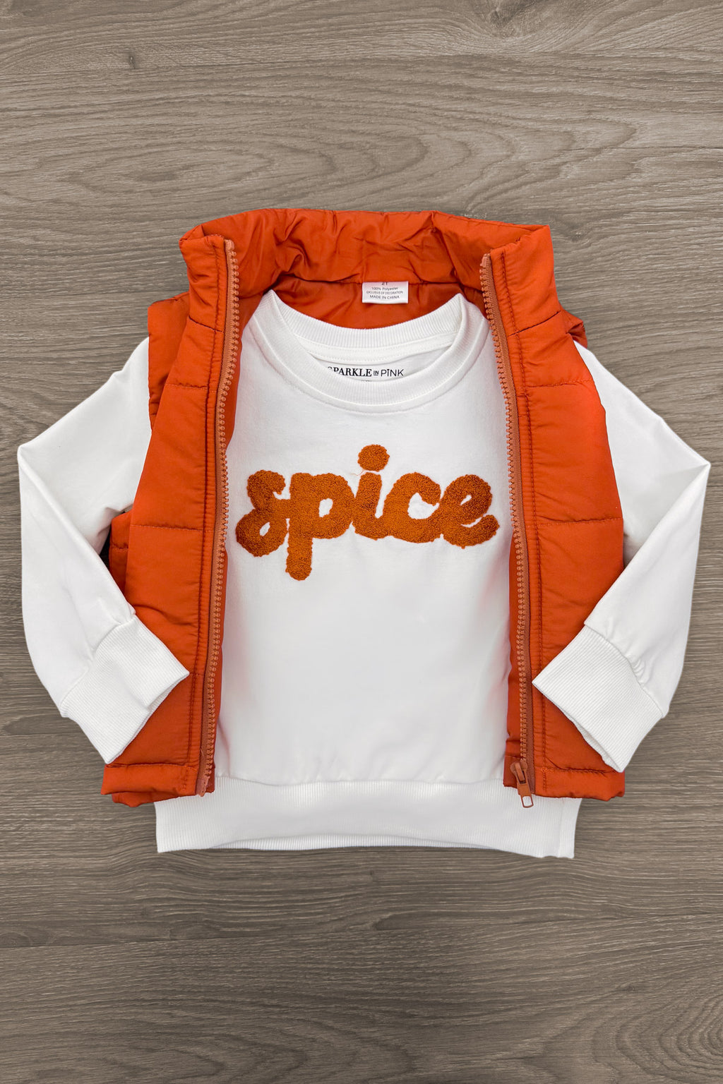 Mom & Me - "Pumpkin & Spice" Vest Set - CHILD-6-12 Months - White long-sleeve shirt with orange "spice" text paired with sleeveless orange quilted vest.