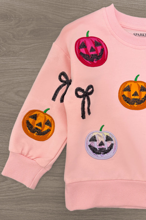 Jack O' Lantern & Bows Velvet Flare Set - 6-12 Months - Pink velvet sweatshirt sleeve with embroidered jack-o'-lanterns and black bow designs.