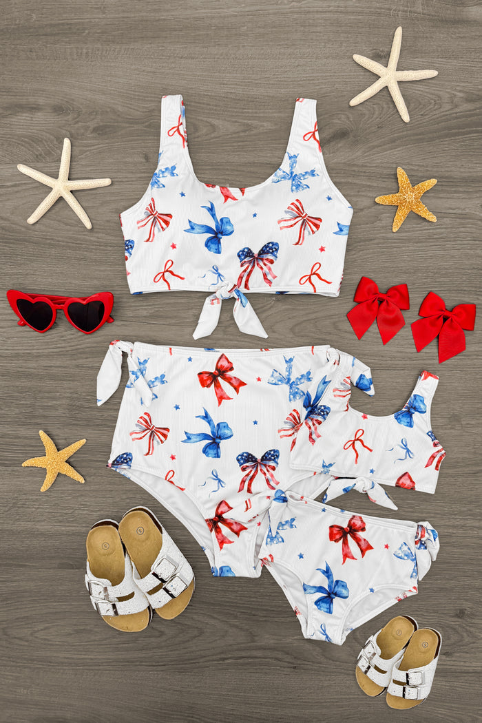 Mom & Me - Red White & Blue Bow Bikini - CHILD-6-12 Months - Red, white, and blue bow print mom and child matching bikini sets with ruched tie bottoms and scooped tops, paired with.