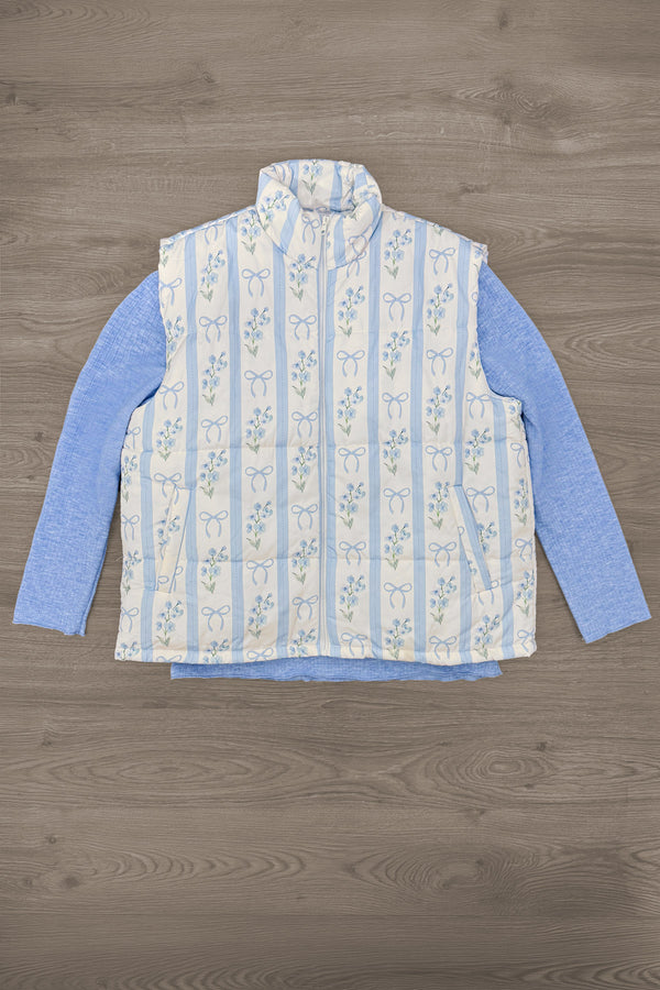 Mom & Me - Blue & White Floral Bow Vest Set - MOM-XS - Blue long-sleeve shirt paired with a sleeveless white vest featuring blue floral stripes and a front zipper closure.