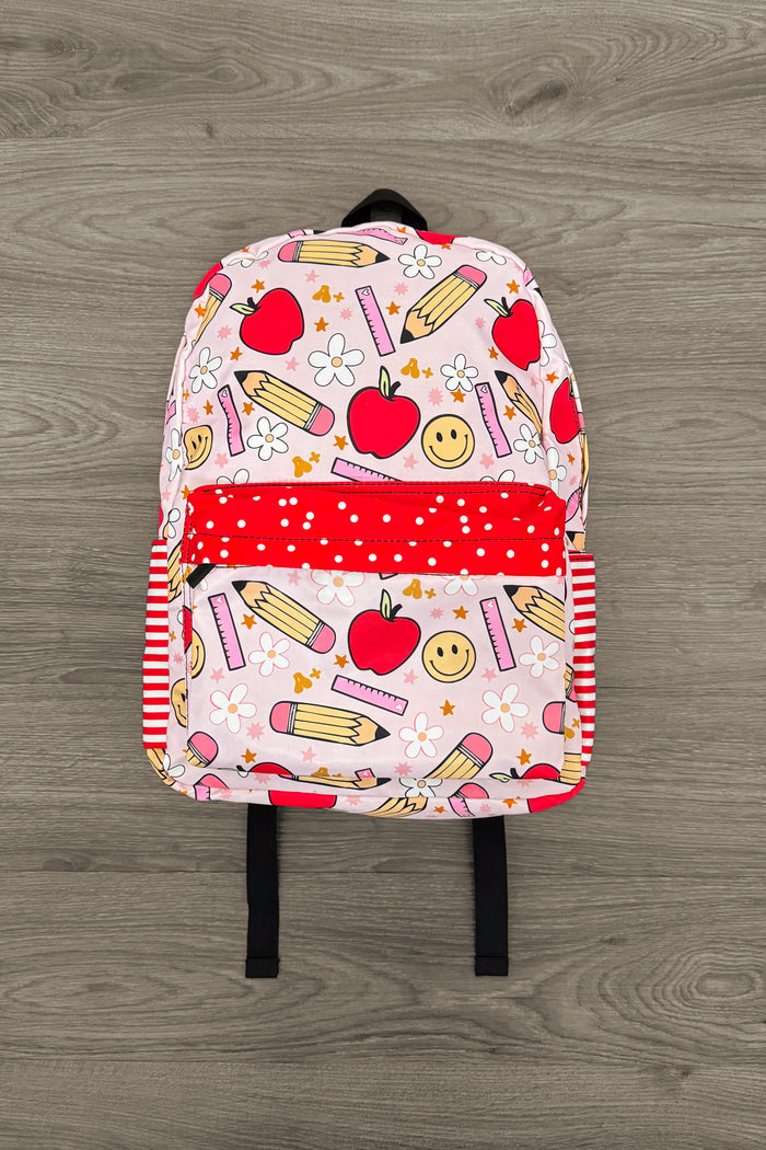 Pink & Red School Supplies Backpack - Default Title - Pink and red backpack with apple, pencil, and smiley face print and front zip pocket.