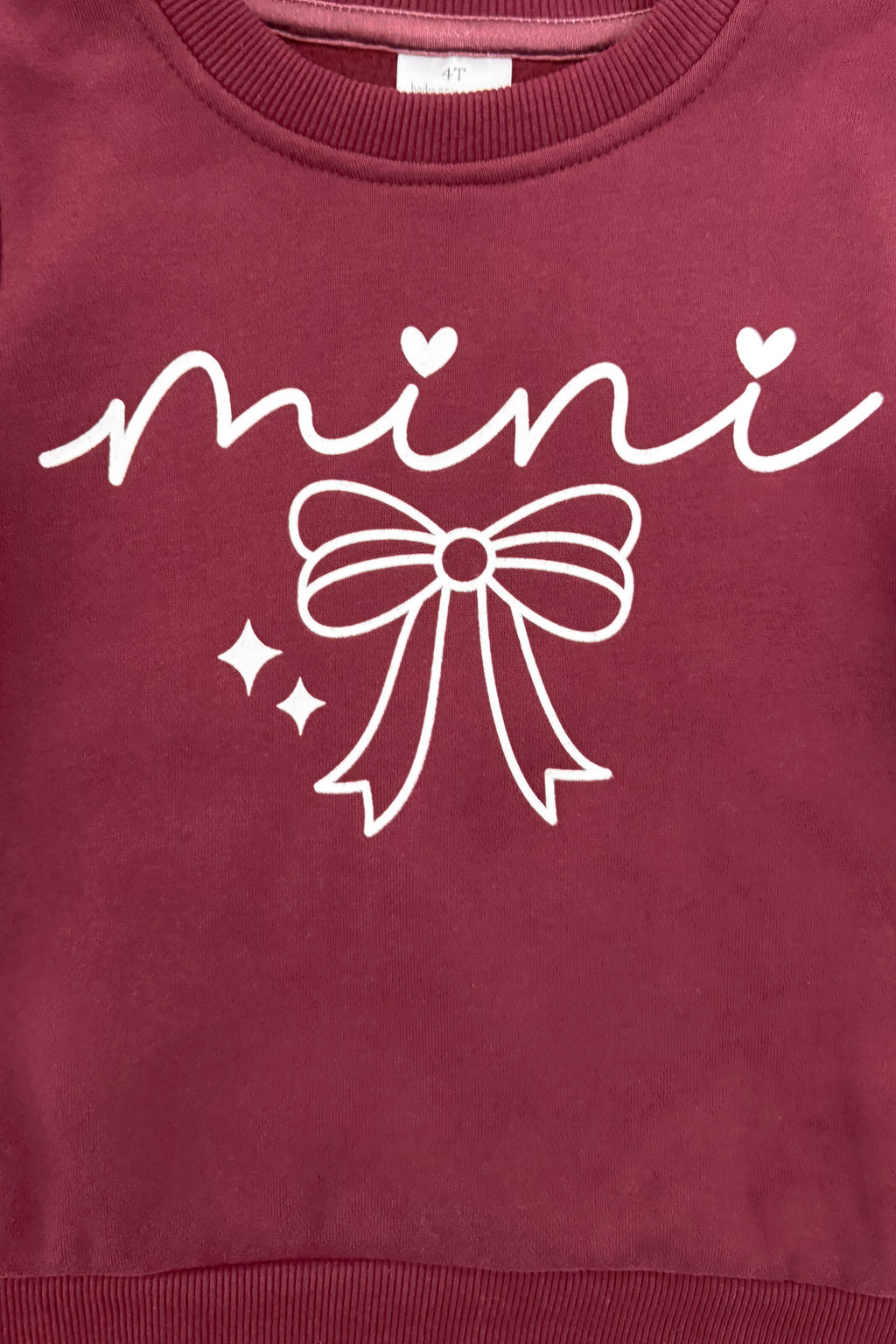 Mom & Me - "Mama & Mini" Burgundy Pullover Sweater - CHILD-6-12 Months - Burgundy pullover sweater with white "mini" text, heart detail, and bow graphic on front.
