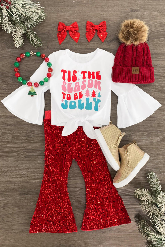 "Tis The Season To Be Jolly" Sequin Bell Bottom Set - 3XS-6-12 Months - White long-sleeve top with red and blue "Tis The Season To Be Jolly" text, red sequin bell-bottom pants, red knit hat with.