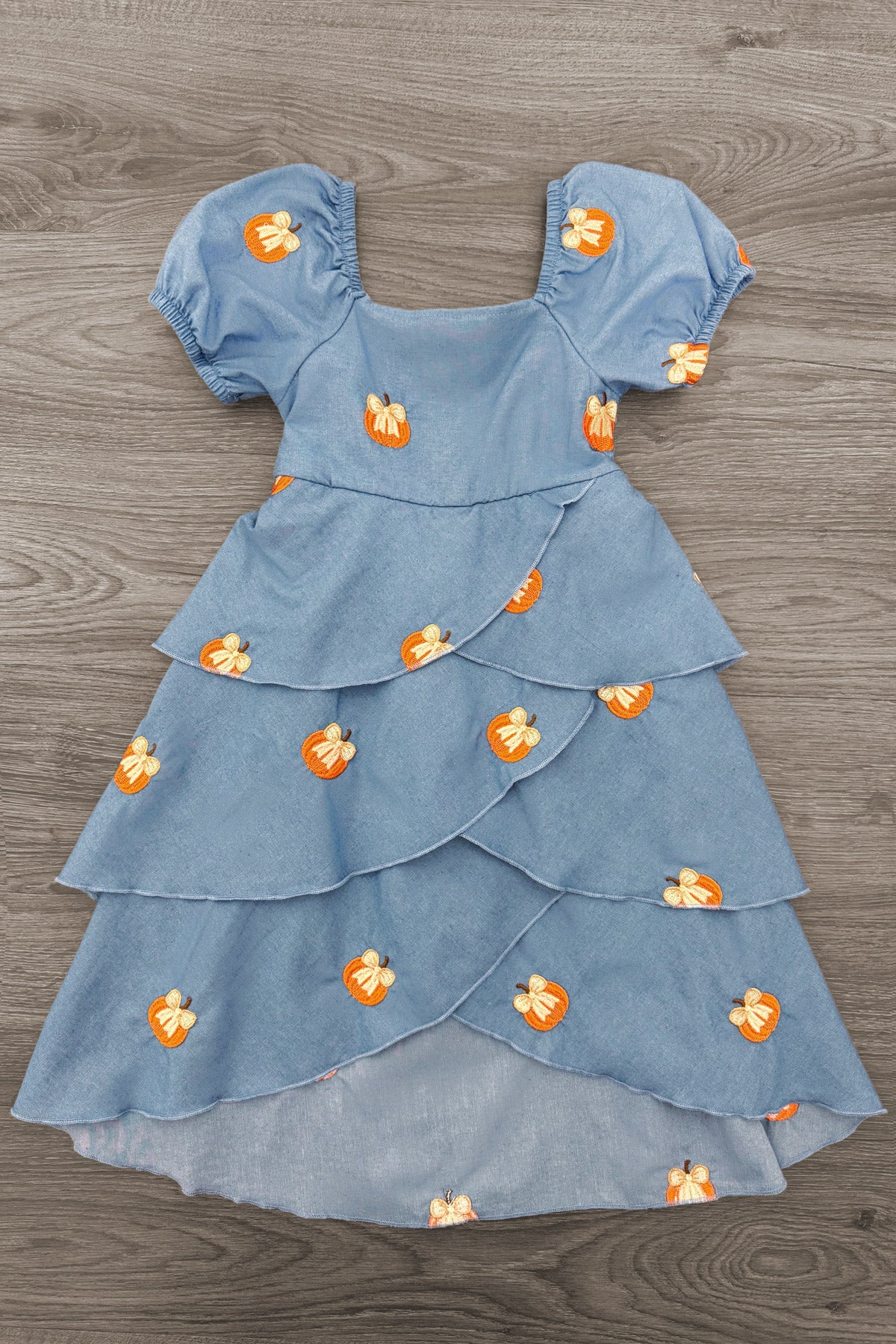 Chambray Pumpkin Maxi Dress - 6-12 Months - Blue chambray maxi dress with puff sleeves, square neckline, tiered ruffle skirt, and small orange pumpkin prints.