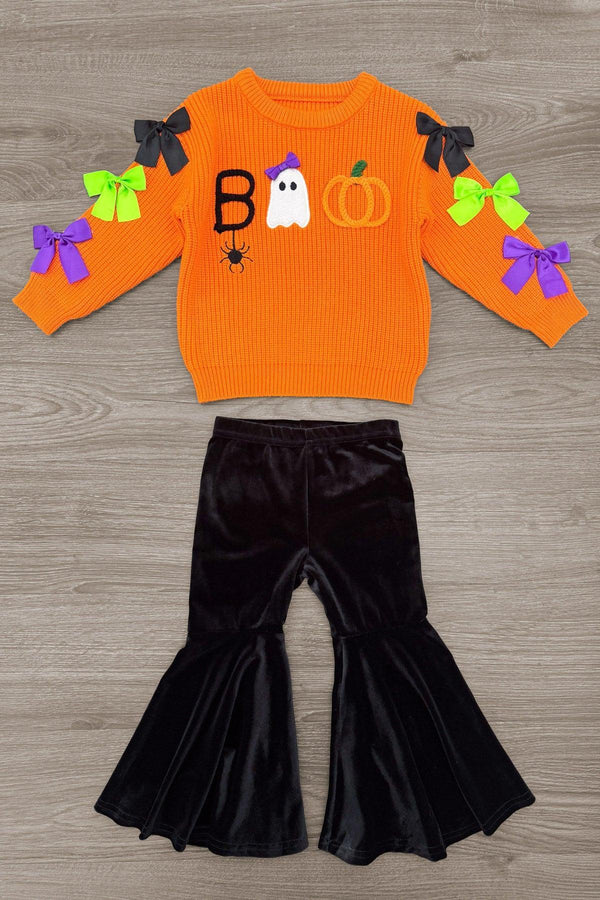 "Boo" Velvet Bell Bottom Set - 6-12 Months - Orange velvet sweatshirt with "BOO" text, ghost graphic, and colorful bows on sleeves; black velvet bell-bottom pants.