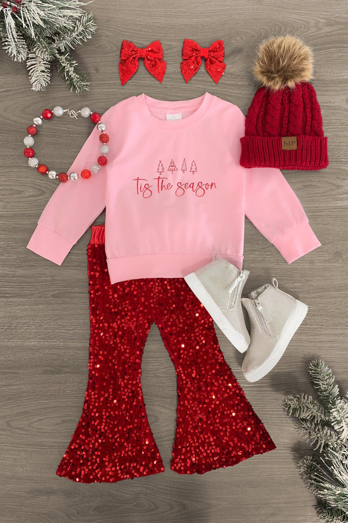 "Tis The Season" Velvet Sequin Bell Bottom Set - 3XS-6-12 Months - Pink long-sleeve shirt with "Tis the Season" text, red sequin bell-bottom pants, white boots, red knit hat with pom-pom, red .