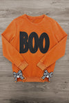 Mom & Me - "Boo" Rust Long Sleeve Top - MOM-XS - Rust-colored long sleeve top with large black "BOO" text and black-and-white striped bow details on hem.