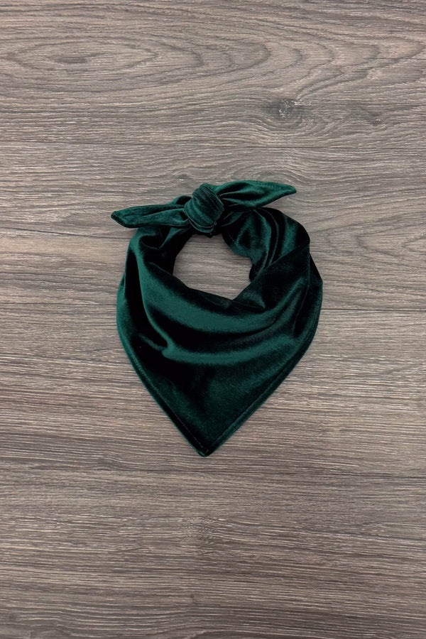 Green & Burgundy Velvet Family Pajamas - AND PET BANDANA! - PET-Green Bandana-FAMILY - Dark green velvet pet bandana with a tied knot and smooth texture on wood background.