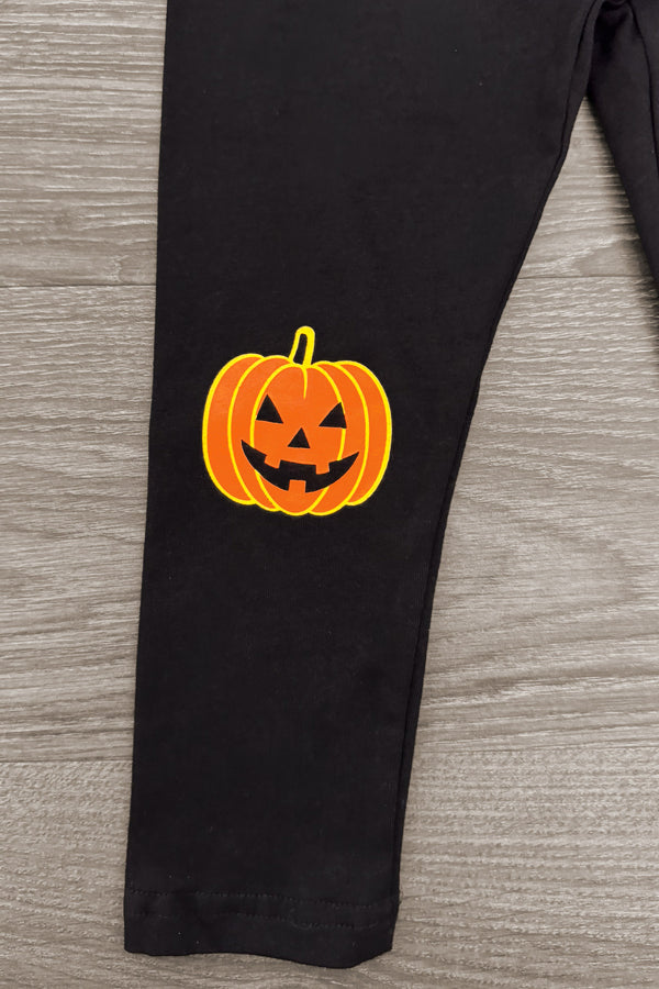 Jack O' Lantern Legging Set - 6-12 Months - Black leggings with a bright orange Jack O' Lantern face printed near the ankle.