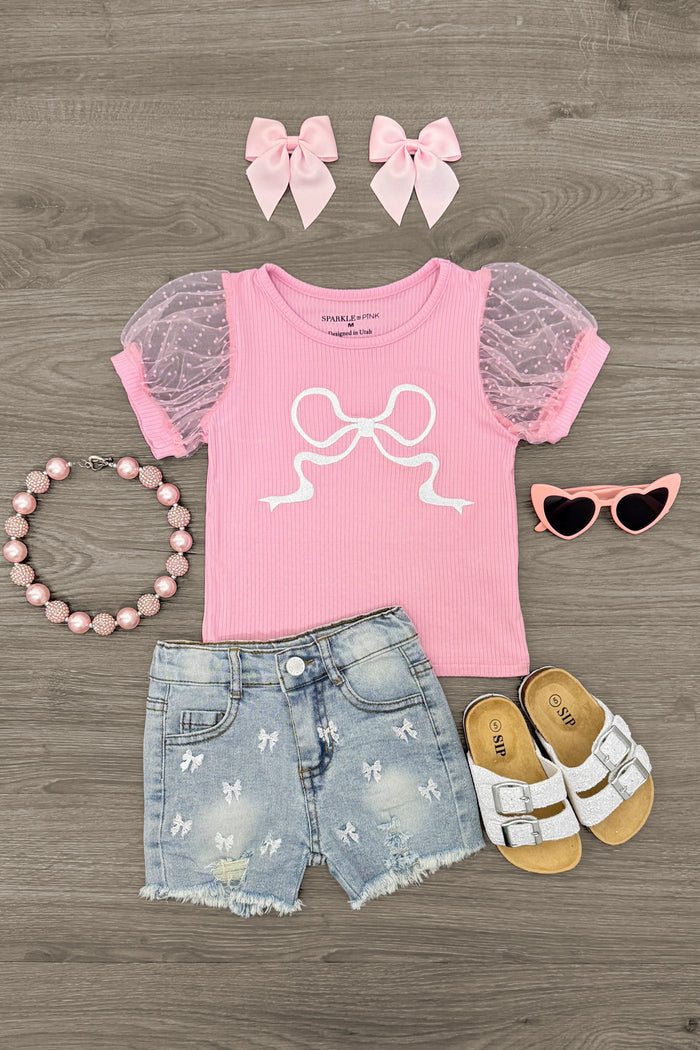 Pink Bow Denim Short Set - 6-12 Months - Pink short-sleeve top with puffed denim sleeves and bow graphic, distressed denim shorts, white sandals, pink bow hair.