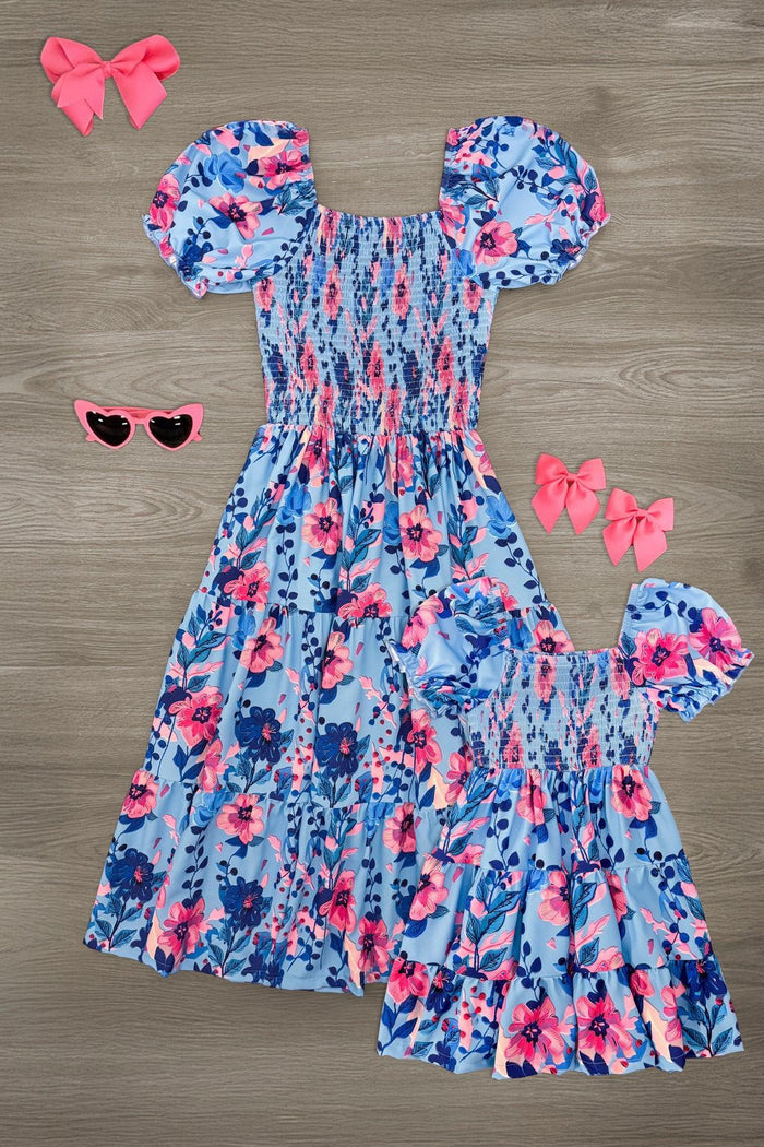 Mom & Me - Blue & Pink Floral Dress - CHILD-6-12 Months - Matching blue and pink floral dresses with puff sleeves, smocked bodices, and ruffled hems for mom and child.