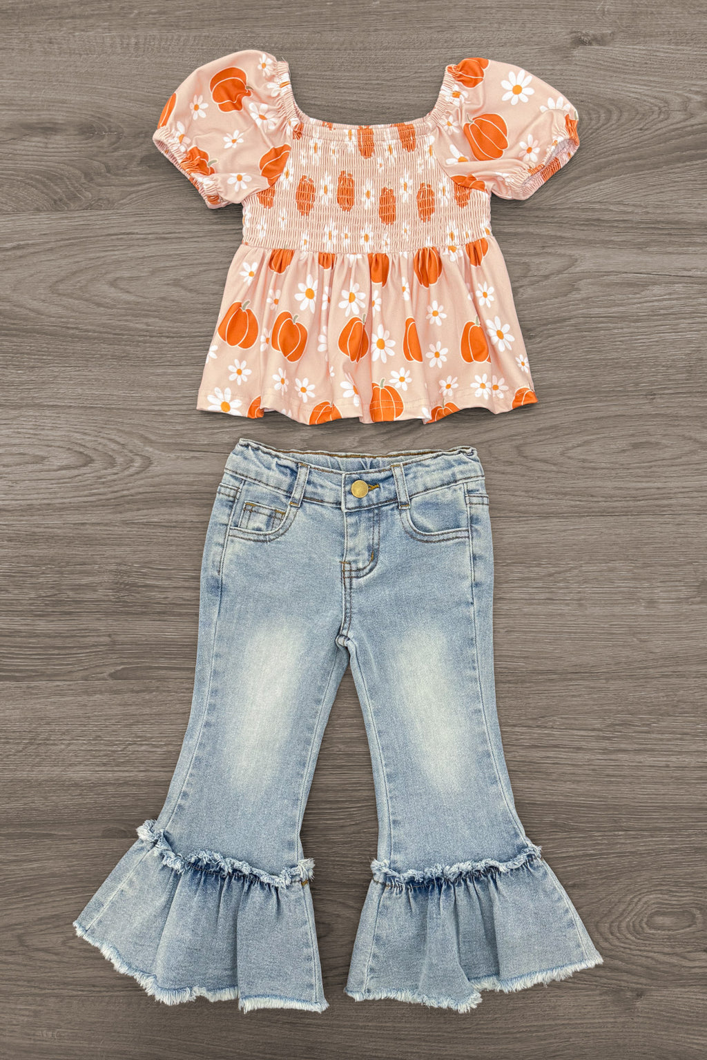 Pumpkin Daisy Denim Bell Bottom Set - 6-12 Months - Orange pumpkin-print puff-sleeve peplum top paired with light-wash denim bell-bottoms with ruffled hems.