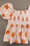 Pumpkin Daisy Denim Bell Bottom Set - 6-12 Months - Pale pink floral baby dress with puff sleeves, smocked bodice, and orange pumpkin print.