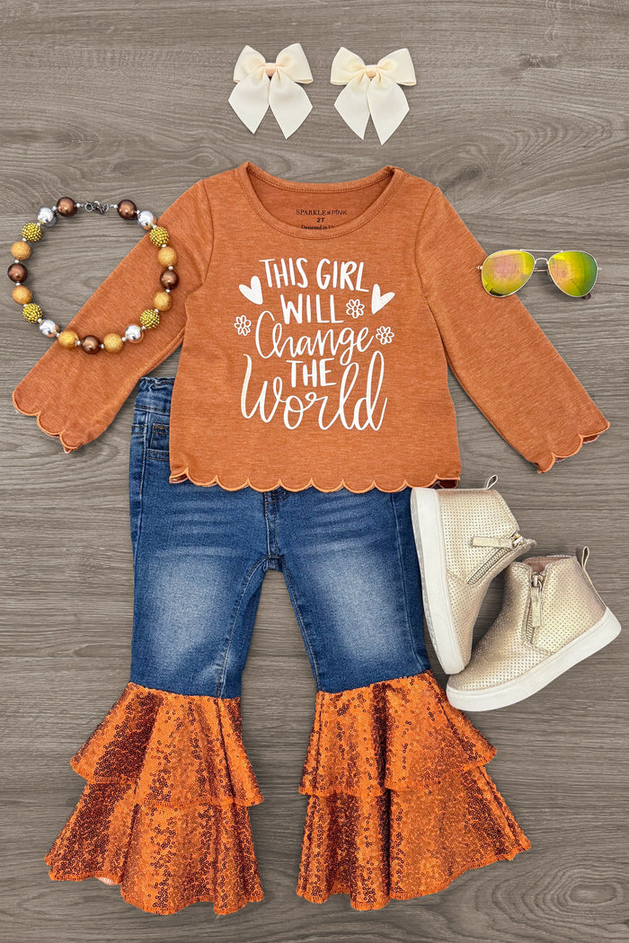 "This Girl Will Change The World" Bell Bottom Pant Set - 6-12 Months - Rust orange long-sleeve top with white "This Girl Will Change The World" text, paired with blue denim bell-bottom pants.