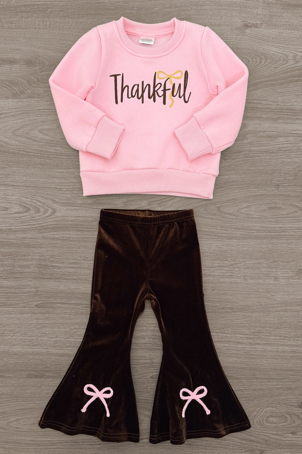 Mom & Me - "Thankful" Pink Pullover & Pant Set - CHILD-6-12 Months - Pink pullover with "Thankful" text in brown paired with brown velvet flare pants featuring pink bow accents.