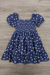 Mom & Me - Navy Floral Dress - CHILD-6-12 Months - Navy blue floral dress with puff sleeves, a smocked bodice, and a gathered skirt.