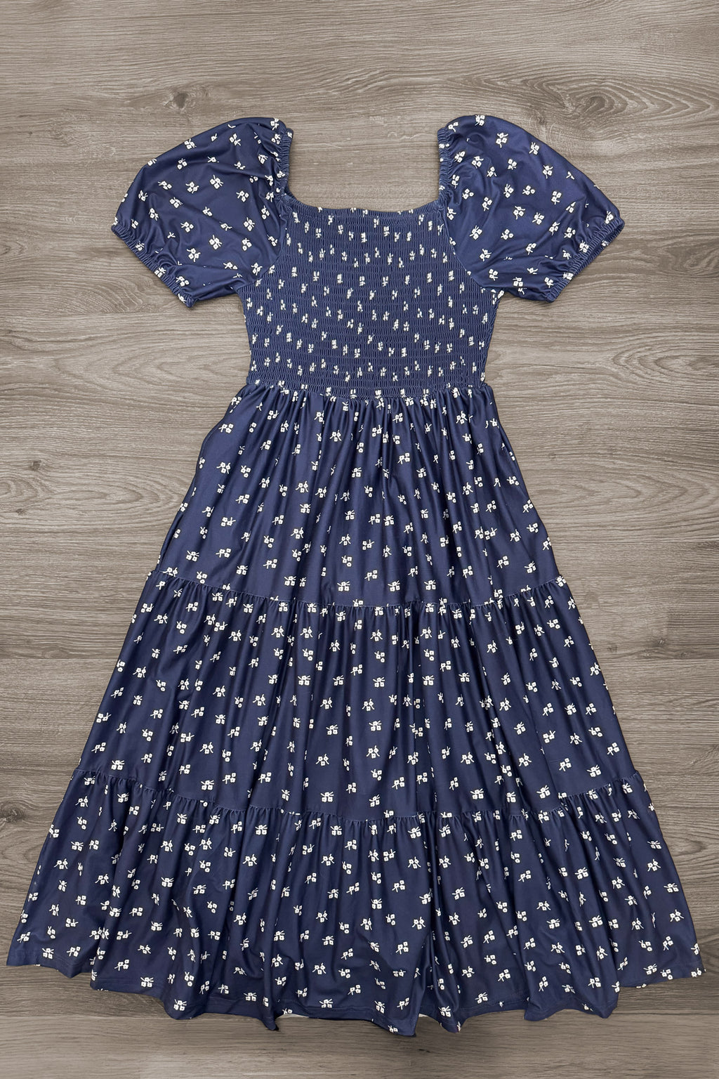 Mom & Me - Navy Floral Dress - MOM-XS - Navy floral dress with puff sleeves, square neckline, and a gathered tiered skirt.