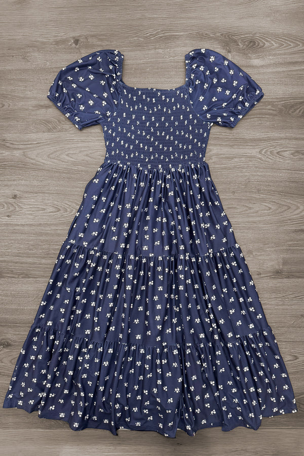 Mom & Me - Navy Floral Dress - MOM-XS - Navy floral dress with puff sleeves, square neckline, and a gathered tiered skirt.