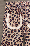 "Thankful" Cheetah Bow Pant Set - 6-12 Months - Beige pants with dark brown and black cheetah print, elastic waistband, and large front pockets trimmed with white ruffles.