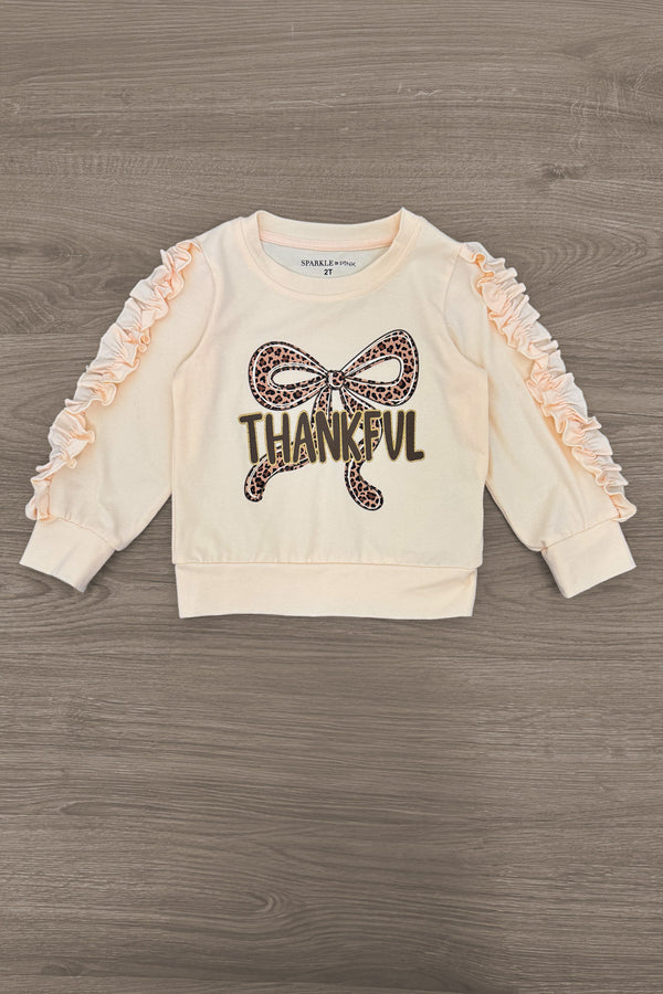 "Thankful" Cheetah Bow Pant Set - 6-12 Months - Cream long-sleeve toddler top with ruched sleeves and cheetah print bow, "THANKFUL" text front.