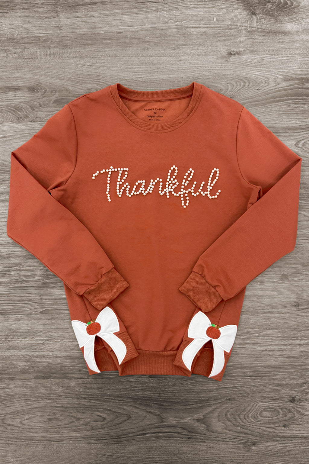 Mom & Me - "Thankful" Bow Pullover - MOM-XS - Brown pullover sweatshirt with "Thankful" script and white bow accents on the front pockets.