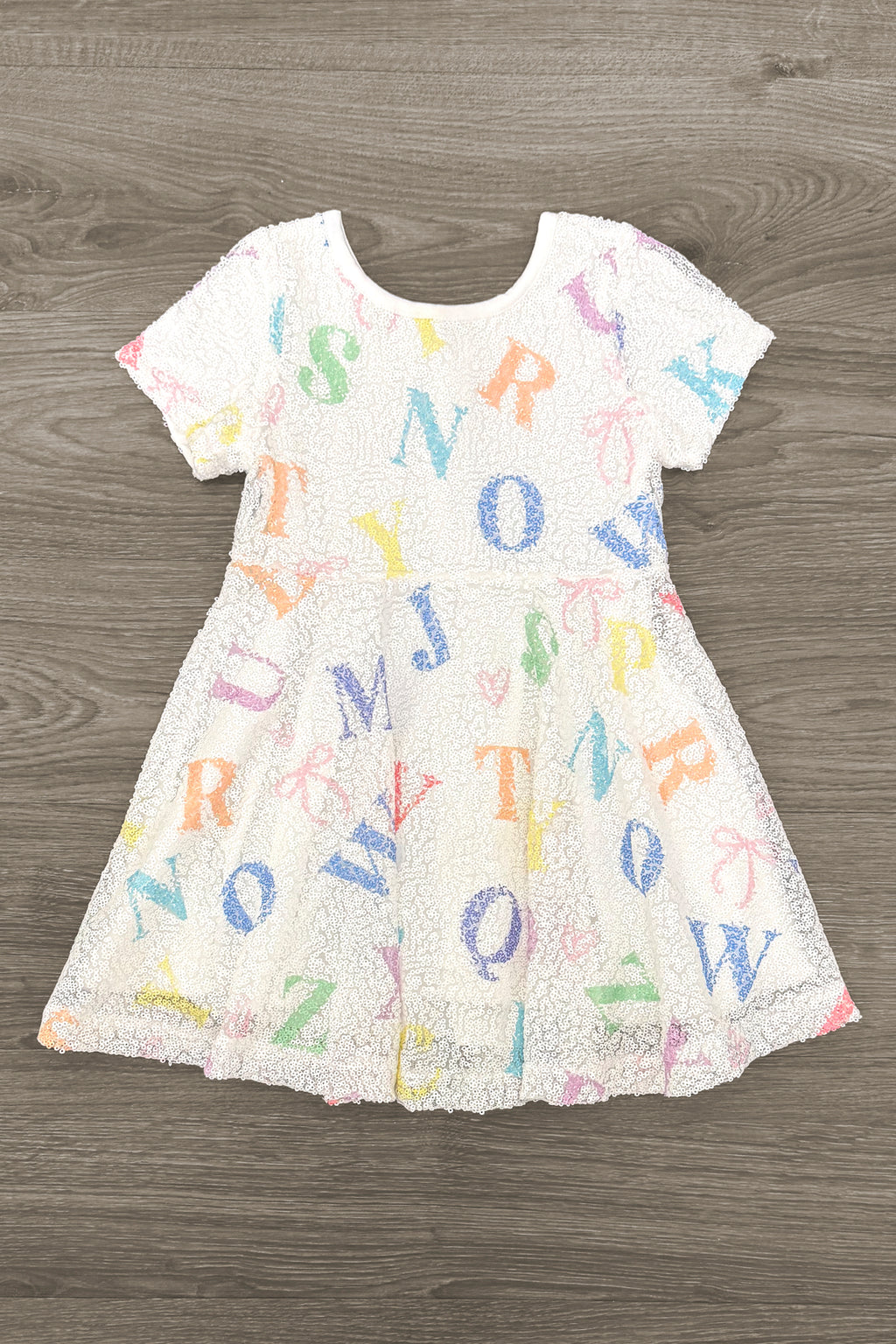 White Sequin Alphabet Bow Dress | Sparkle in Pink