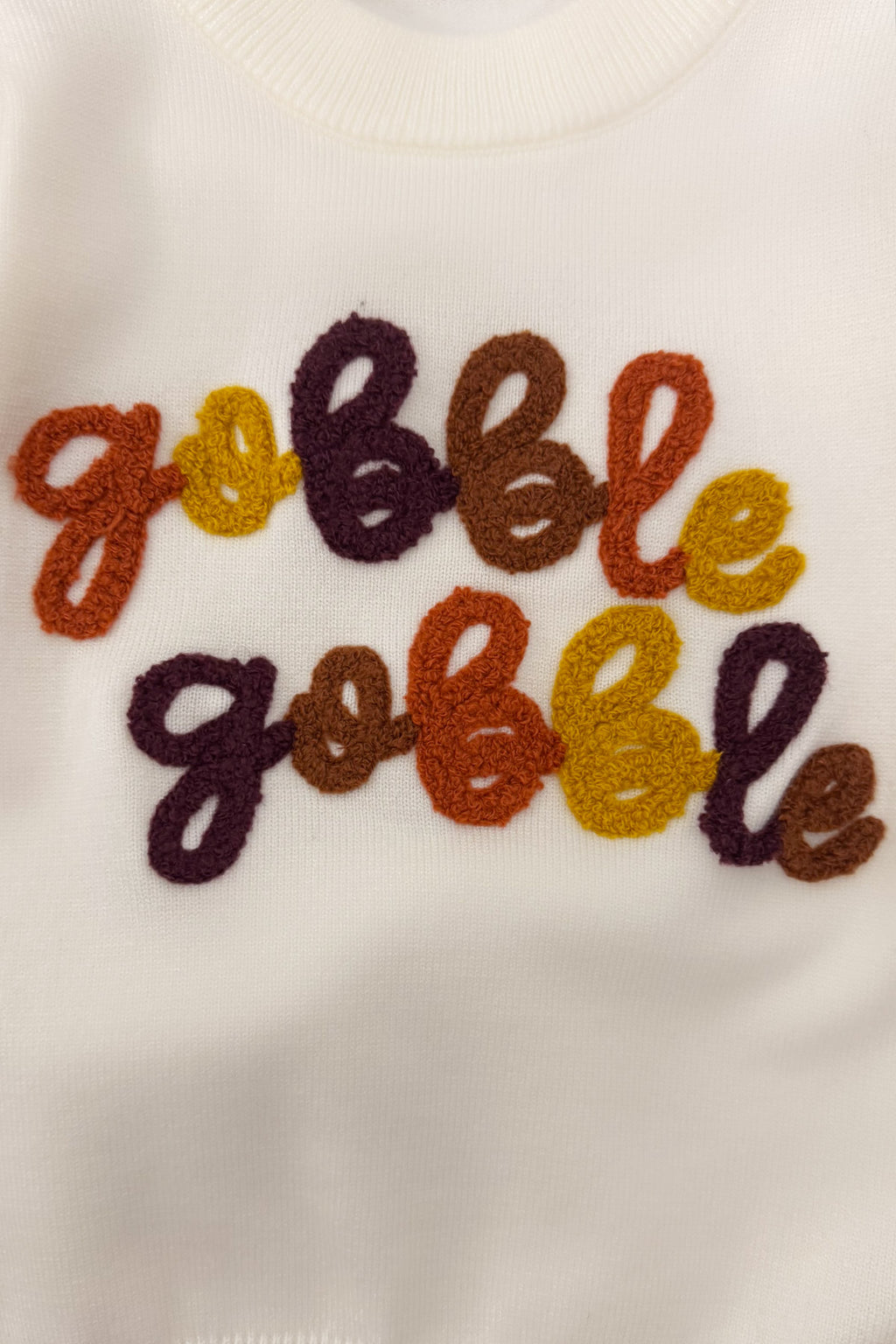 "Gobble Gobble" Pearl Flare Pant Set - 6-12 Months - Cream knit fabric with raised rust, mustard, and plum lettering spelling “Gobble Gobble.”.