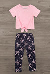 Pink & Black Bow Legging Set - 6-12 Months - Pink short-sleeve top with a knotted hem paired with black leggings covered in pink bows.