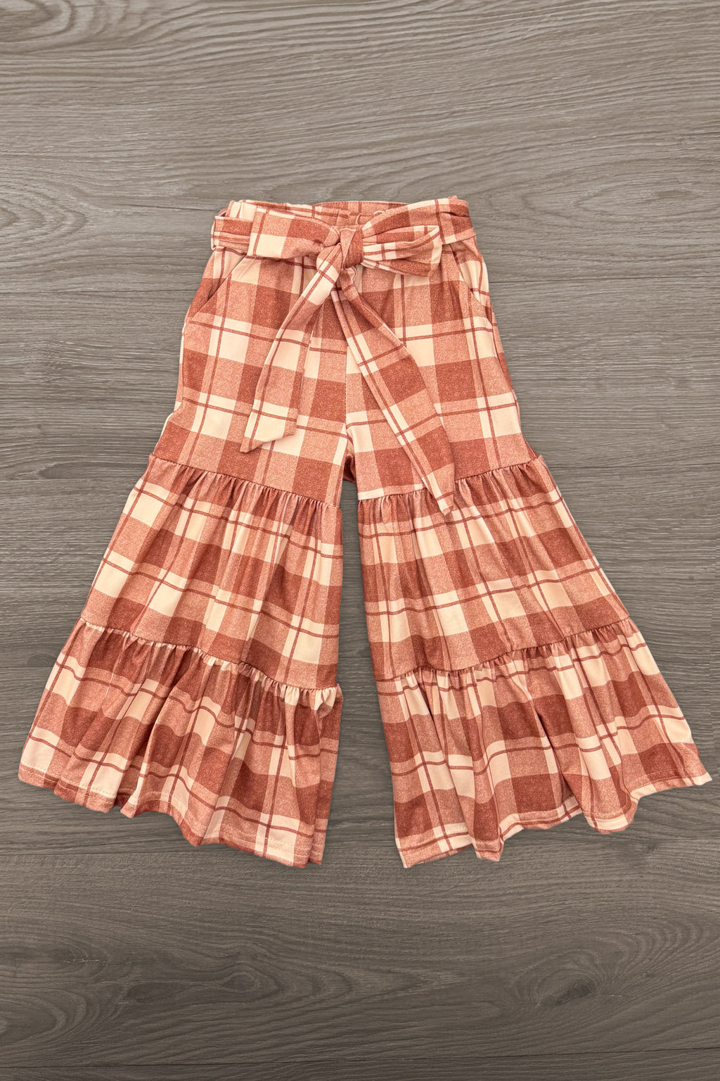 "Grateful, Blessed, Thankful" Plaid Pant Set - 6-12 Months - Rust and cream plaid wide-leg pants with a paperbag waist, tie belt, and tiered ruffle hems.