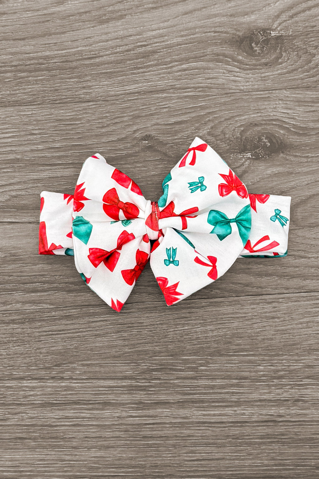Mom & Me - Red & Green Bow Pajamas - BABY-Bow Headband - White fabric hair bow with a red knot and festive red and green bow print.