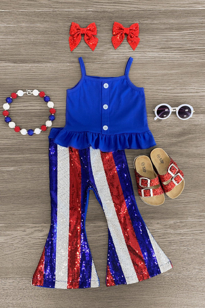 Blue Striped Sequin Bell Bottom Set - 3XS-6-12 Months - Blue sequin bell bottom set with red, white, and blue vertical stripes, ruffled sleeveless top, paired with red bows, beaded .