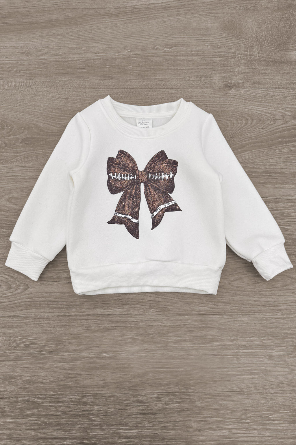 Bow Football Sequin Pant Set - 6-12 Months - White long-sleeve sweatshirt with a brown football sequin bow graphic on the front.