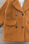 Brown Sherpa Jacket - 6-12 Months - Rust-brown sherpa jacket with a plush fleece texture, wide lapels, flap pockets, and dark buttons.