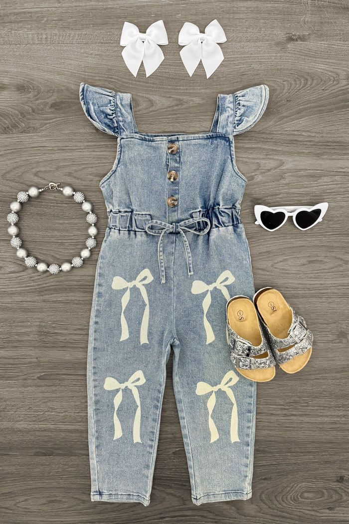 Bow Denim Jumpsuit - 6-12 Months - Light blue denim jumpsuit with bow prints, flutter sleeves, and button-front detail.