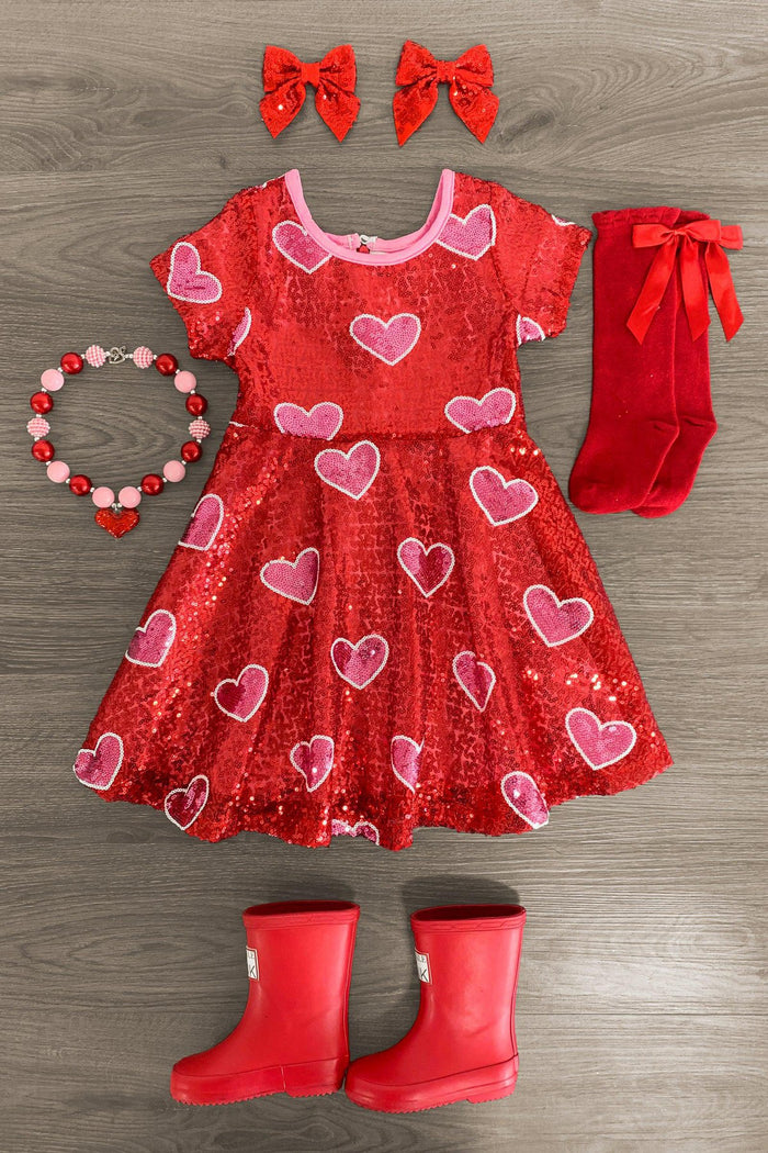 Red Sequin Hearts Dress - 3XS-6-12 Months - Red sequin dress with pink heart patterns, short sleeves, flared skirt, paired with red bow hair clips, red knee-high socks.