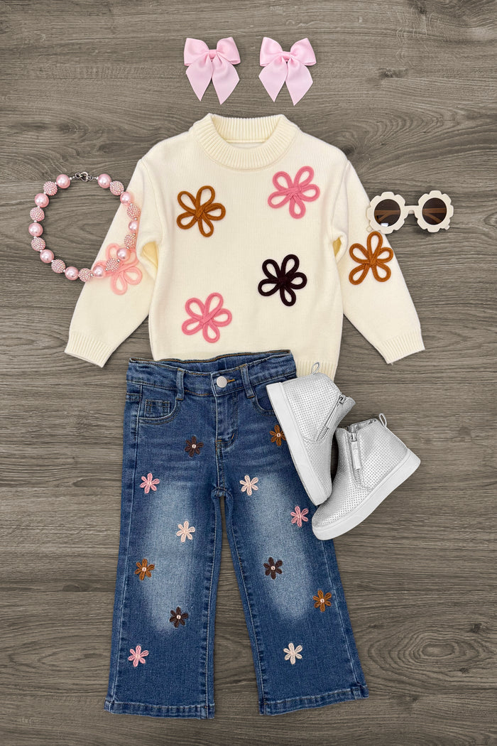 Cream Flower Print Denim Pant Set - 6-12 Months - Cream long-sleeve sweater with colorful flower prints paired with blue denim pants featuring matching flower embroidery,.