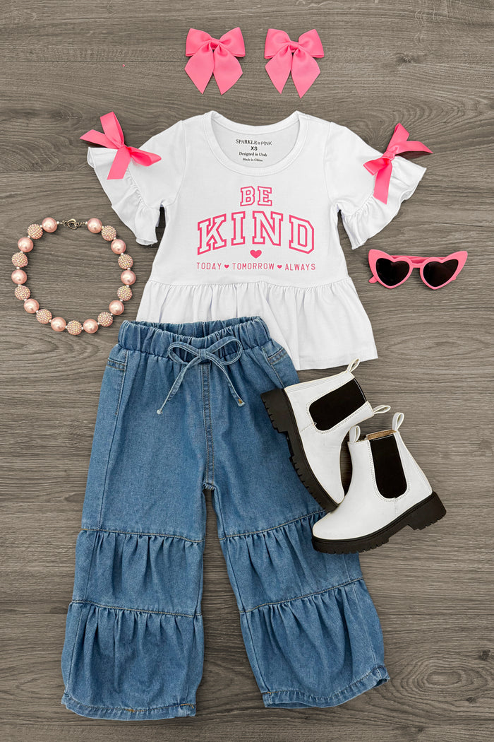 "Be Kind..." Pink Bow Denim Pant Set - 6-12 Months - White short-sleeve top with pink "Be Kind" text and denim tiered pants with drawstring waist, paired with white boots, pink.