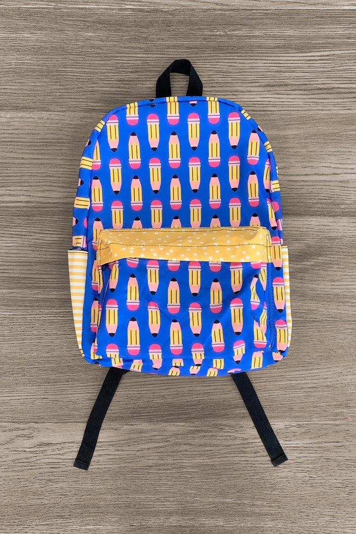 Blue & Yellow Pencil Backpack - Default Title - Blue backpack with yellow pencil pattern and front zippered pocket on wooden floor.