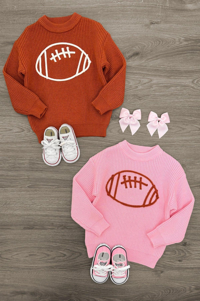 Football Knit Sweater - Boy or Girl - BOY-3XS-6-12 Months-FAMILY - Brown knit sweater with white football graphic, paired with white sneakers and pink knit sweater with brown football.
