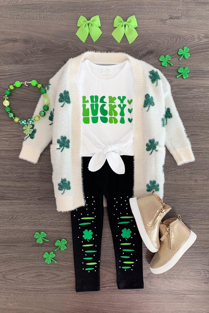 "Lucky" Four-Leaf Clover Legging Set - 3XS-6-12 Months - Toddler outfit with white cardigan featuring green four-leaf clovers, white "Lucky" shirt, black leggings with clover.