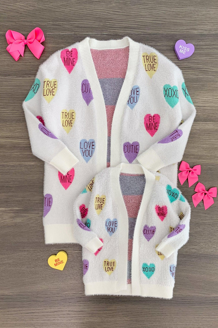 Mom & Me - Candy Hearts Cardigan - BABY-0-3 Months-FAMILY - Cream cardigan set with colorful candy heart patterns and front pockets in adult and child sizes.