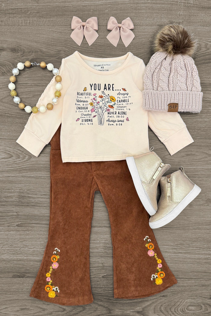 "You Are..." Brown Corduroy Flare Set - 3XS-6-12 Months - Cream long-sleeve tee with floral text print, brown corduroy flare pants with embroidered flowers, pink knit hat with.