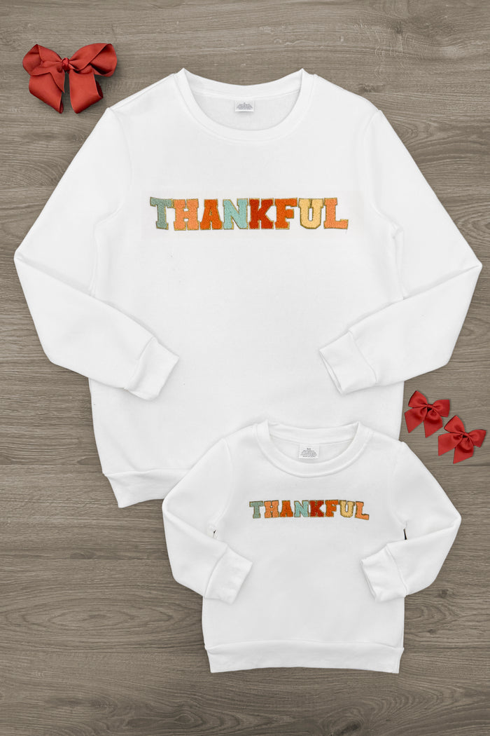 Mom & Me - "Thankful" Sweatshirt - CHILD-3XS-6-12 Months - White matching adult and child sweatshirts with "THANKFUL" in colorful block letters, styled with red bows.
