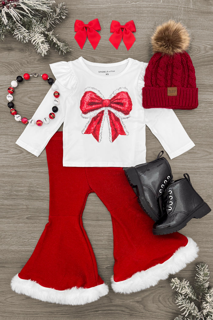 Santa Bow Glitter Bell Bottom Set - 3XS-6-12 Months - White long-sleeve top with red glitter bow, red bell-bottom pants with white fur trim, red knit hat with pom-pom, black.