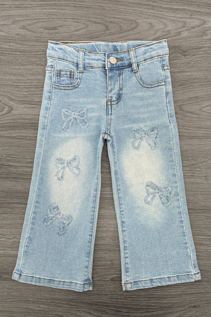 Sequin Bow Denim Pants - 3XS-6-12 Months - Light wash denim pants with faded butterfly sequin bows on front legs and classic five-pocket design.