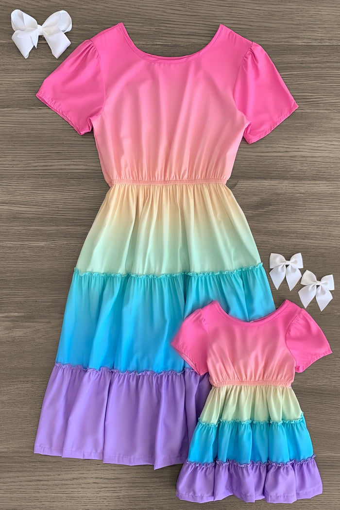 Mom & Me - Rainbow Tiered Dress - BABY-0-3 Months-FAMILY - Matching mom and child rainbow tiered dresses with short sleeves and elastic waist, laid flat with white hair bows.