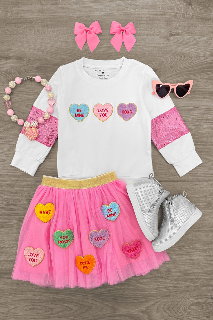 Candy Hearts Tutu Skirt Set - 3XS-6-12 Months - White long-sleeve shirt with colorful candy heart graphics and pink tutu skirt with candy heart appliques, paired with pink.